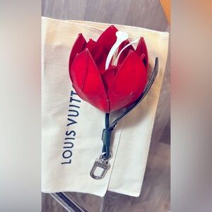 AUTHENTIC LOUIS VUITTON RED POPPY BAG CHARM.